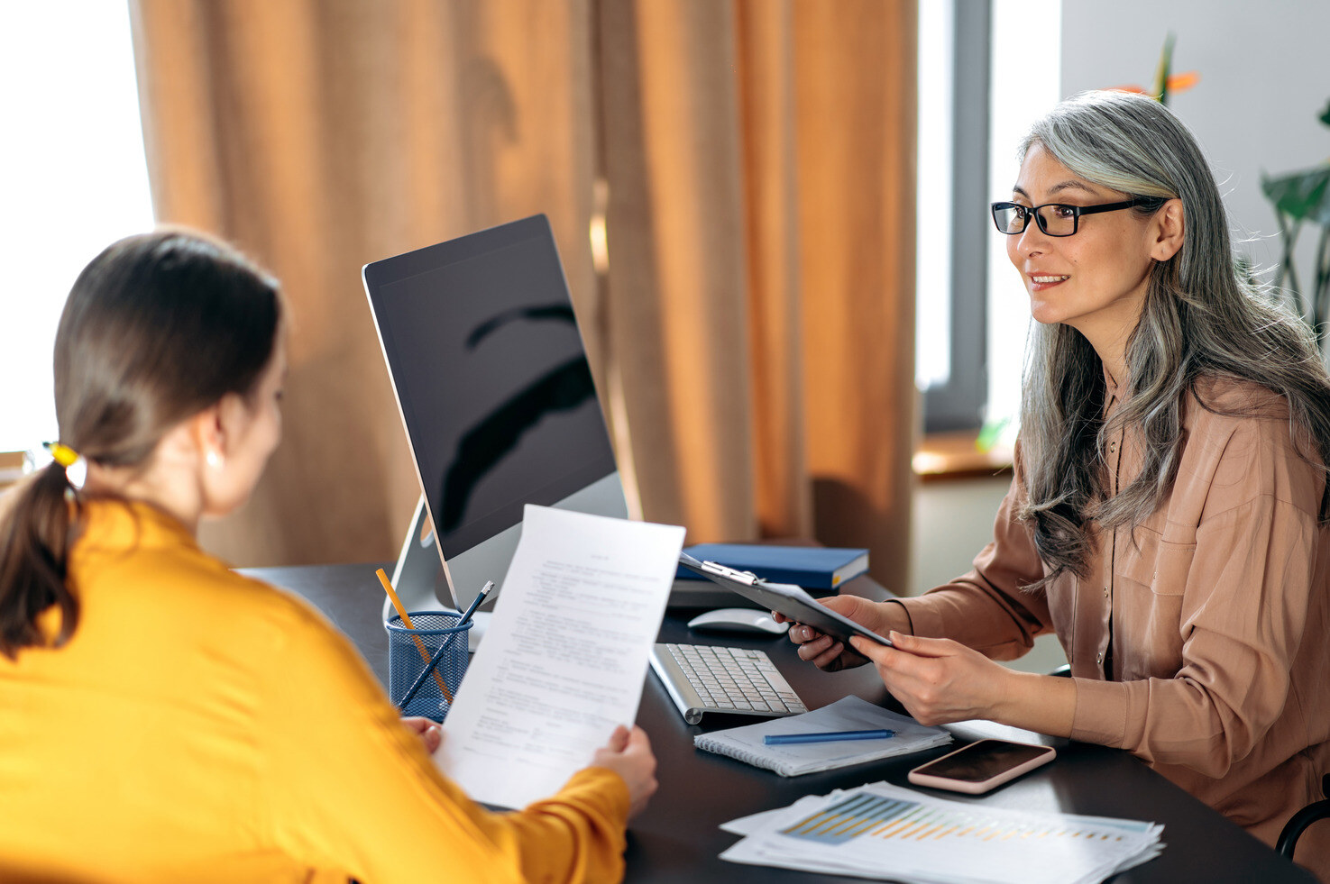 hr-manager-office-asian-resume-smiling-2023-11-27-05-02-18-utc (1)