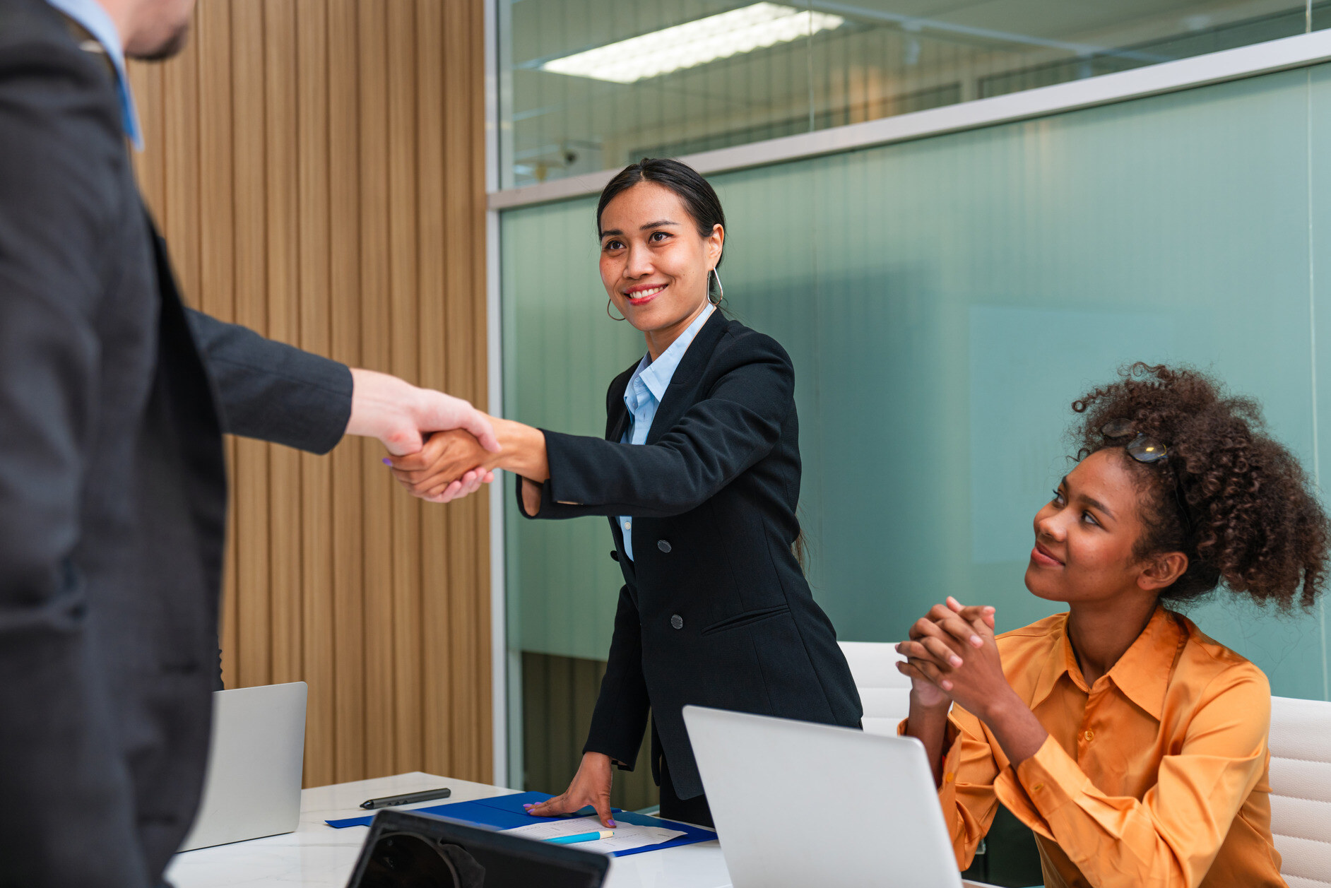 multiracial-business-people-having-meeting-and-bra-2024-07-09-00-48-37-utc (1)